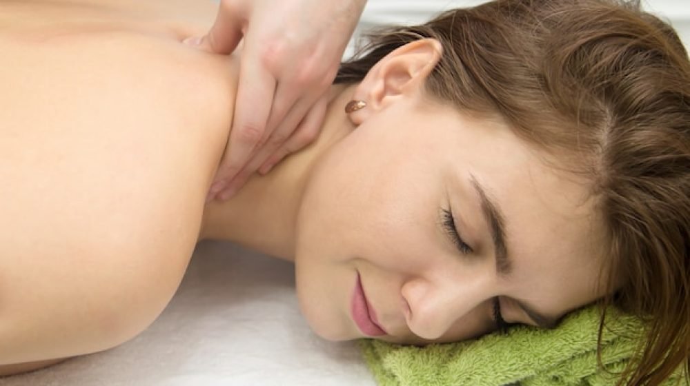 back-massage-area-shoulder-blades-along-woman-s-spine_131087-1279